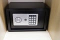 Closed safe on shelf of cabinet Royalty Free Stock Photo