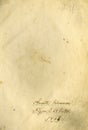 Closed seamless image of old yellowed sheet of paper with dark spots and a facsimile of the inscription. Royalty Free Stock Photo