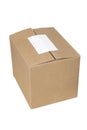 Closed shipping cardboard box whit empty tag Royalty Free Stock Photo