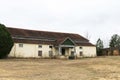 Closed shut down abandoned factory business warehouse building Royalty Free Stock Photo