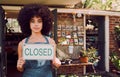 Closed sign, black woman and business failure for cafÃÂ©, employee and worker with end of day. African American girl