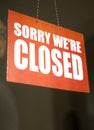 Closed sign board hanging on door of cafe or small store Royalty Free Stock Photo