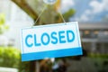 Closed sign hanging on door at store Royalty Free Stock Photo
