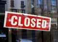 Closed sign in shop window Royalty Free Stock Photo