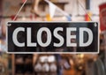 Closed sign on a shop window Royalty Free Stock Photo