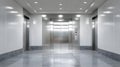 Closed stainless steel elevator doors in a modern building hallway. Royalty Free Stock Photo