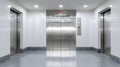 Closed stainless steel elevator doors in a modern building hallway. Royalty Free Stock Photo