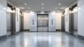 Closed stainless steel elevator doors in a modern building hallway. Royalty Free Stock Photo
