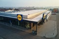 Closed supermarket with Lidl logo, aerial view