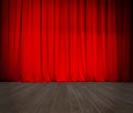 Closed theater red curtain and wood stage or scene Royalty Free Stock Photo
