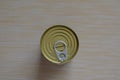 Closed tin can with open key Royalty Free Stock Photo