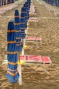 Closed umbrellas on the beach