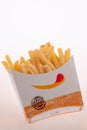 Closed up of Burger King's french fries on white background. Focus on Burger King's logo
