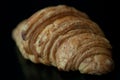 Croissant in black background