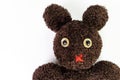 Closed up of cute handcraft fluffy brown yarn mixed between bear