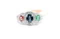 Closed up Emerald, Blue Sapphire and Pink Diamond with white diamond and Platinum ring