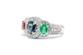 Closed up Emerald, Blue Sapphire and Pink Diamond with white diamond and Platinum ring Royalty Free Stock Photo