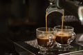 Closed-up espresso machine brewing coffee