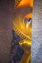 Closed up face from window of Reclining Buddha gold statue in Wat Pho Royalty Free Stock Photo