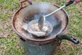 Closed up fried fish on stove, thai local life