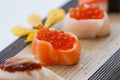 Closed-Up Ikura Salmon Roe Sushi Wraped with Salmon.