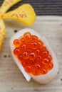 Closed-Up Ikura Salmon Roe Sushi Wraped with Tai Red Seabeam Fish. Royalty Free Stock Photo