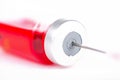 Closed up injection needle and medicine vial Royalty Free Stock Photo