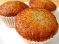 Closed Up Mouthwatering Banana Muffins Served on a White Plate