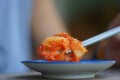 Closed up organic kimchi homemade tasty sour and spicy picking by chopsticks