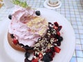 Closed up pancake with strawberry whipping cream and berry
