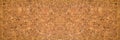 Closed up of panoramic brown cork board texture with yellow saffron boarder for banner background Royalty Free Stock Photo