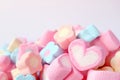 Closed Up a Pink and White Heart Shaped Marshmallow on the Pile of Pastel Color Flower Shaped Marshmallow Candies Royalty Free Stock Photo