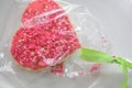 Closed-up Red Colour Candy Coated Heart Shaped Christmas Gingerbread.