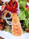 Closed up salad with shrimp and japanease sauce