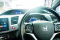 Closed up shot of Honda Logo at steering wheel