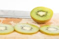 Closed up sliced kiwi fruit on wood floor Royalty Free Stock Photo