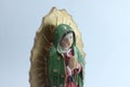 Small Figure Statue of Blessed Virgin Mary in Roman Catholic Church on white background. Royalty Free Stock Photo