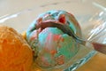 Closed Up Spoon Scooping Up Pastel Color Bubble Gum Ice Cream in a Glass Bowl Royalty Free Stock Photo