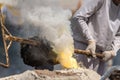 closed up of steel worker raking furnace in an industry Royalty Free Stock Photo