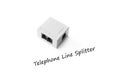 Closed up telephone line splitter on white background Royalty Free Stock Photo