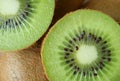 Closed up texture of cut in half vibrant green fresh and juicy ripe kiwi fruit Royalty Free Stock Photo