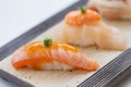 Closed-Up Torched Salmoni Sushi and Hotate Scallop Sushi. Royalty Free Stock Photo