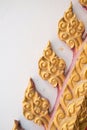 Closed up traditional Thai Sculpture and pattern in wall of temple Royalty Free Stock Photo