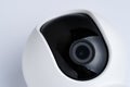 Closed up view of Internet IP video camera with small wide angle lens with white plastic cover using in security monitoring or Royalty Free Stock Photo