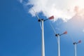 Closed up Wind turbine generating electricity on blue sky with clounds,Windmills for electric power ecology concept Royalty Free Stock Photo