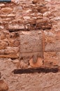 Closed up, window with stone and concrete with lumber header and sill in external wall of a Provence prison cell Royalty Free Stock Photo