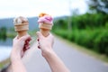 Closed up woman hand holding couple Waffle strawberry and chocolate Ice Cream Royalty Free Stock Photo