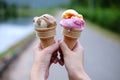 Closed up woman hand holding couple Waffle strawberry and chocolate Ice Cream Royalty Free Stock Photo