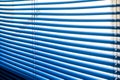 Closed Venetian blinds on a windows