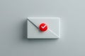 closed white envelope with a red check mark, symbolizing successful email delivery or validation Royalty Free Stock Photo